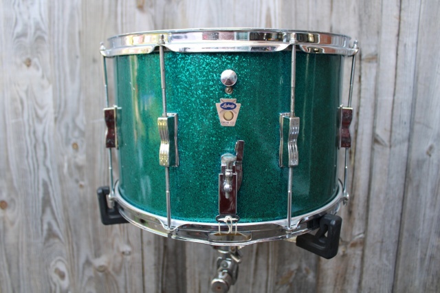 Ludwig Transitional Badge 14x10 Marcher in Aqua Sparkle